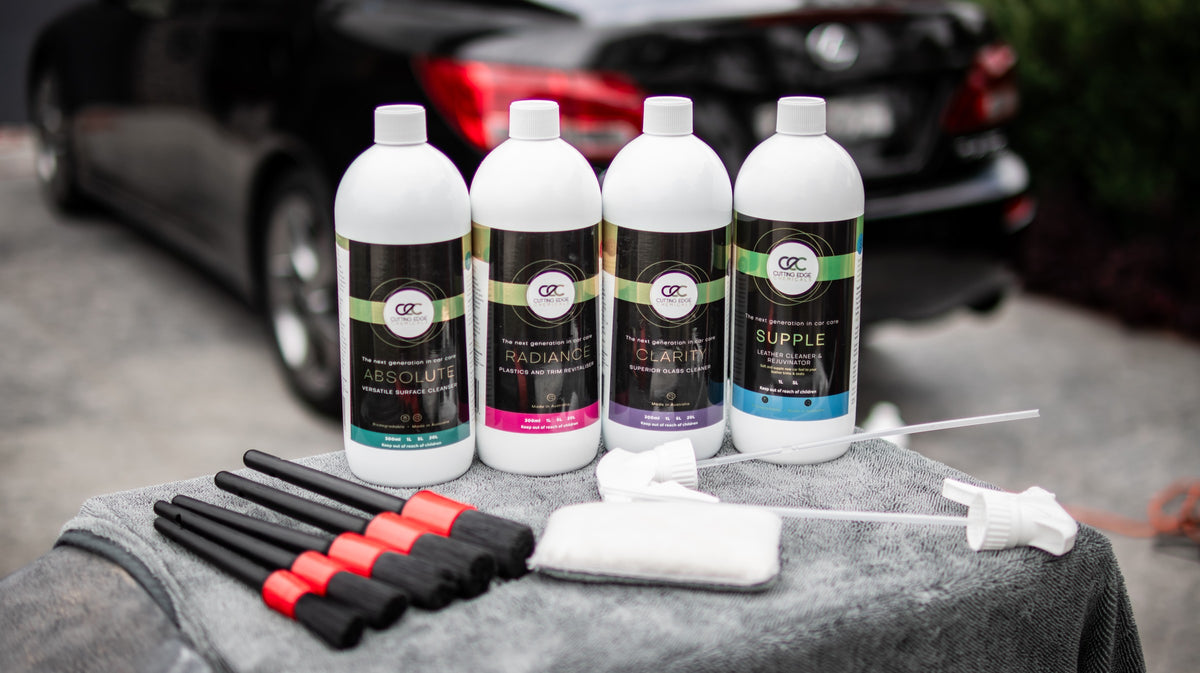 Interior car cleaning kit with ABSOLUTE, RADIANCE, CLARITY and SUPPLE 1L, five detailing brushes and microfibre applicator